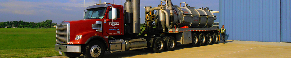 Red Tractor with Vacuum Trailer