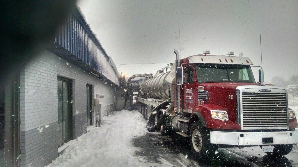 PitClean Vac Truck at a carwash in the snow.